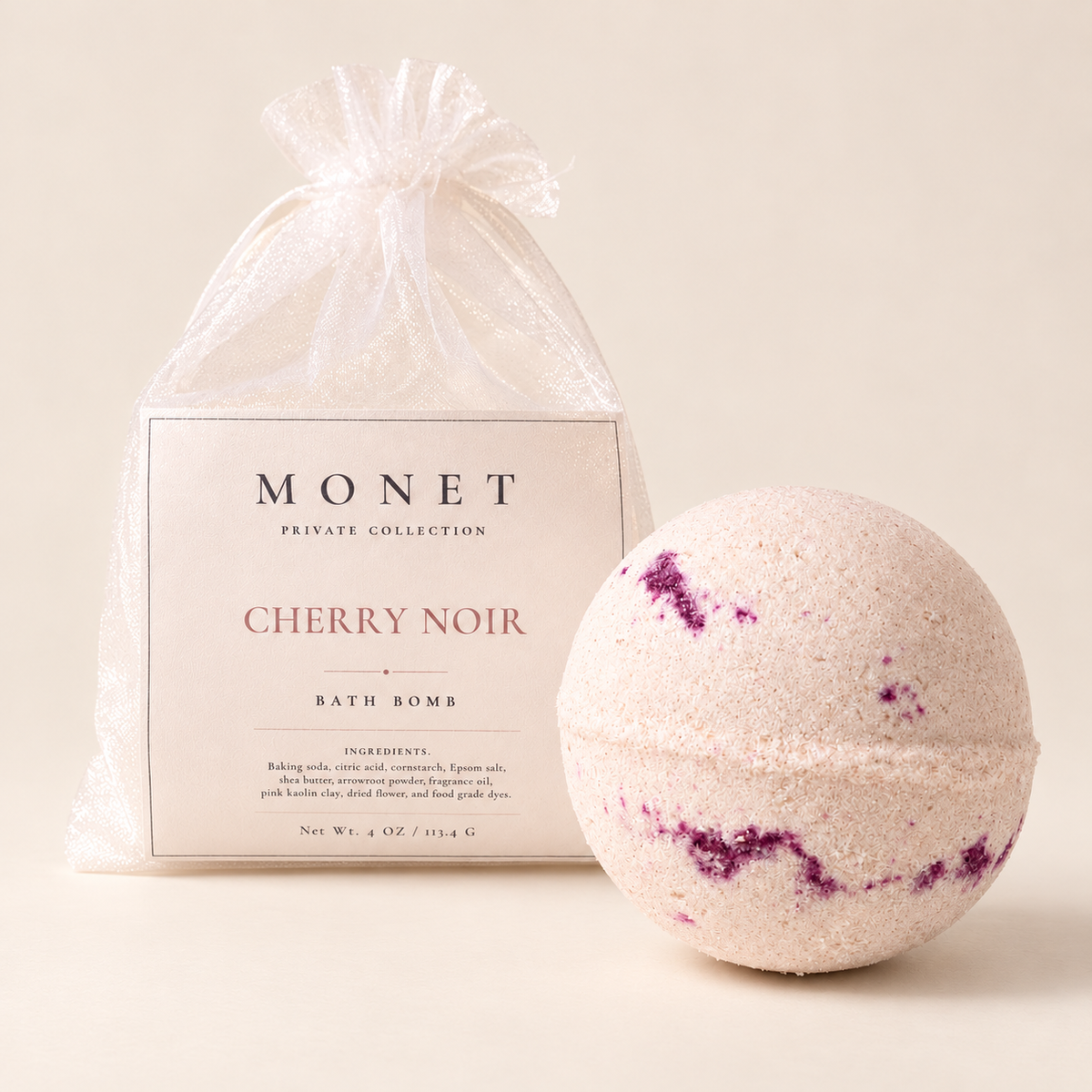 Cherry Noir — Bath Bomb, on warm ivory
