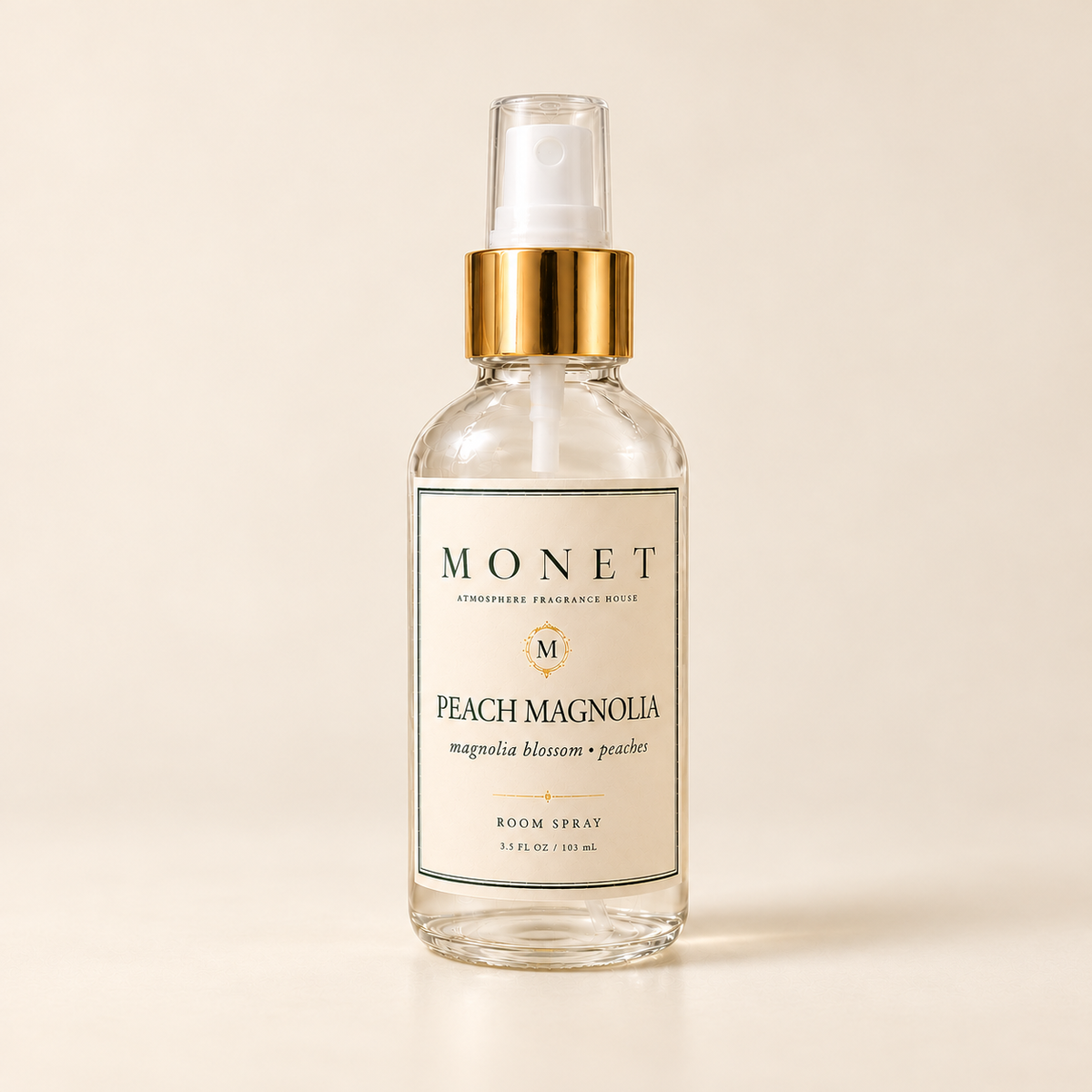 peach magnolia MONET room spray on warm ivory background